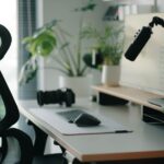 Stylish home office setup with ergonomic chair, plants, and tech accessories creating a modern work environment. - Photo by Alpha En on Pexels