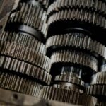 Detailed shot of mechanical gears showcasing intricate steel parts and engineering precision. - Photo by cottonbro studio on Pexels